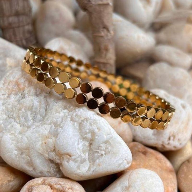 Bracelete em Aço Inox Esferas - Aço com banho de Ouro