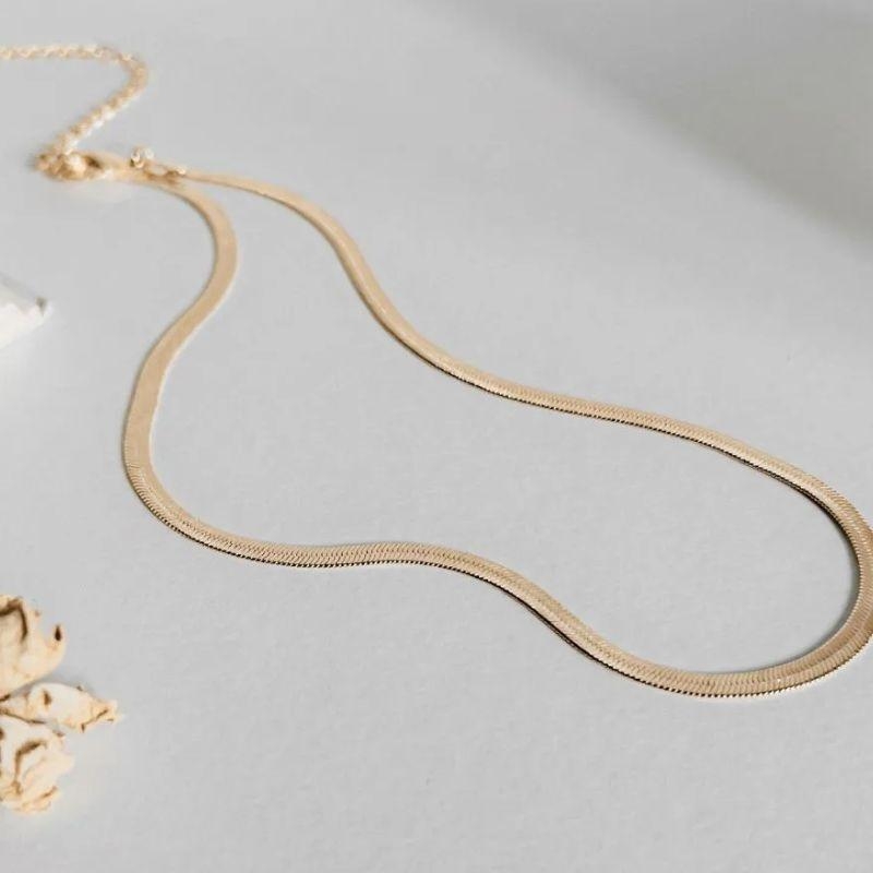 Fita laminada de 3mm  45cm + 7cm de extensor - Aço com Banho de Ouro