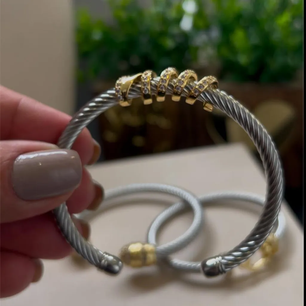 Bracelete em cabo de aço Meio Banhado a ouro