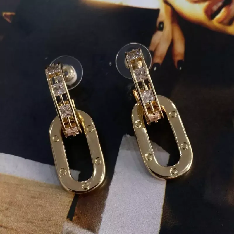 Brinco de Argola tarraxa pingente oval com Zircônias