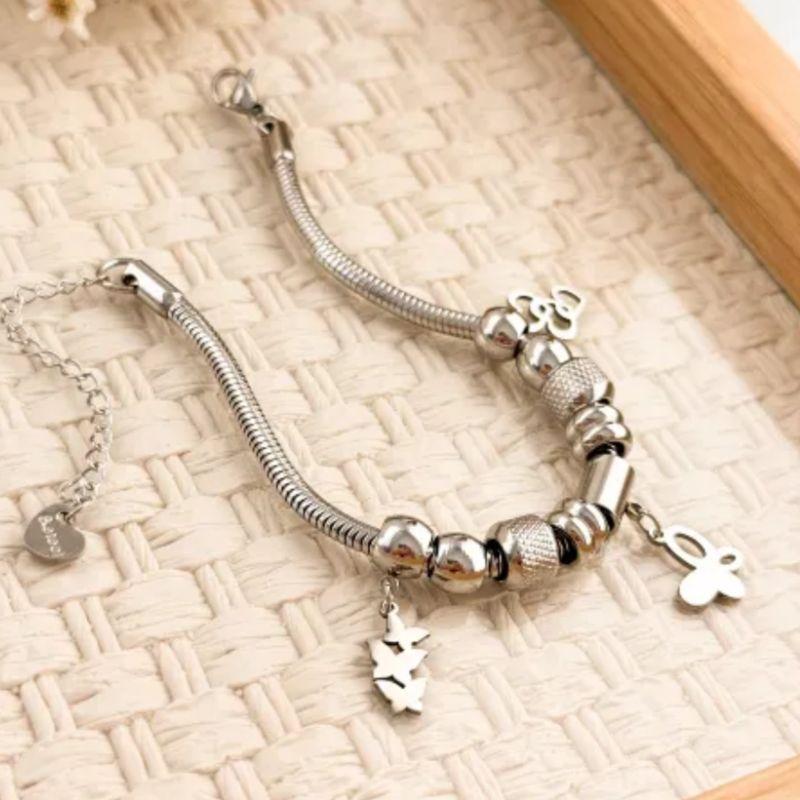Pulseira com berloques em aço inoxidável